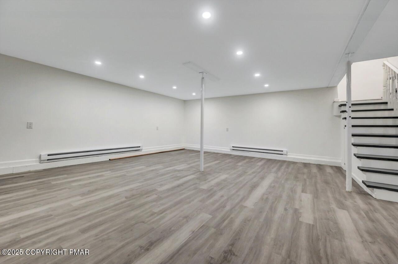 752 Toll Road Effort, PA 18330 - Photo 59 of 101 an empty room with wooden floor
