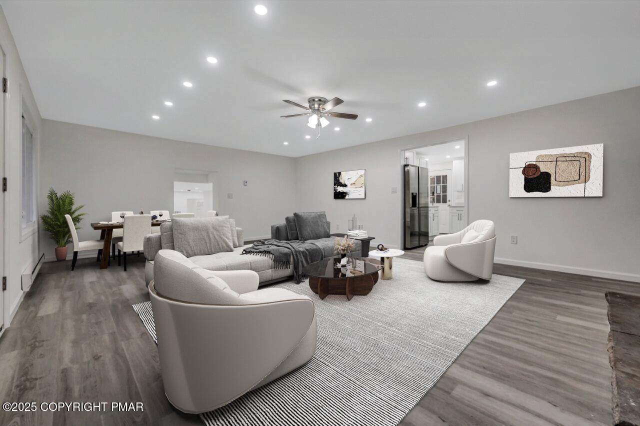752 Toll Road Effort, PA 18330 - Photo 8 of 101 a living room with furniture and a couch