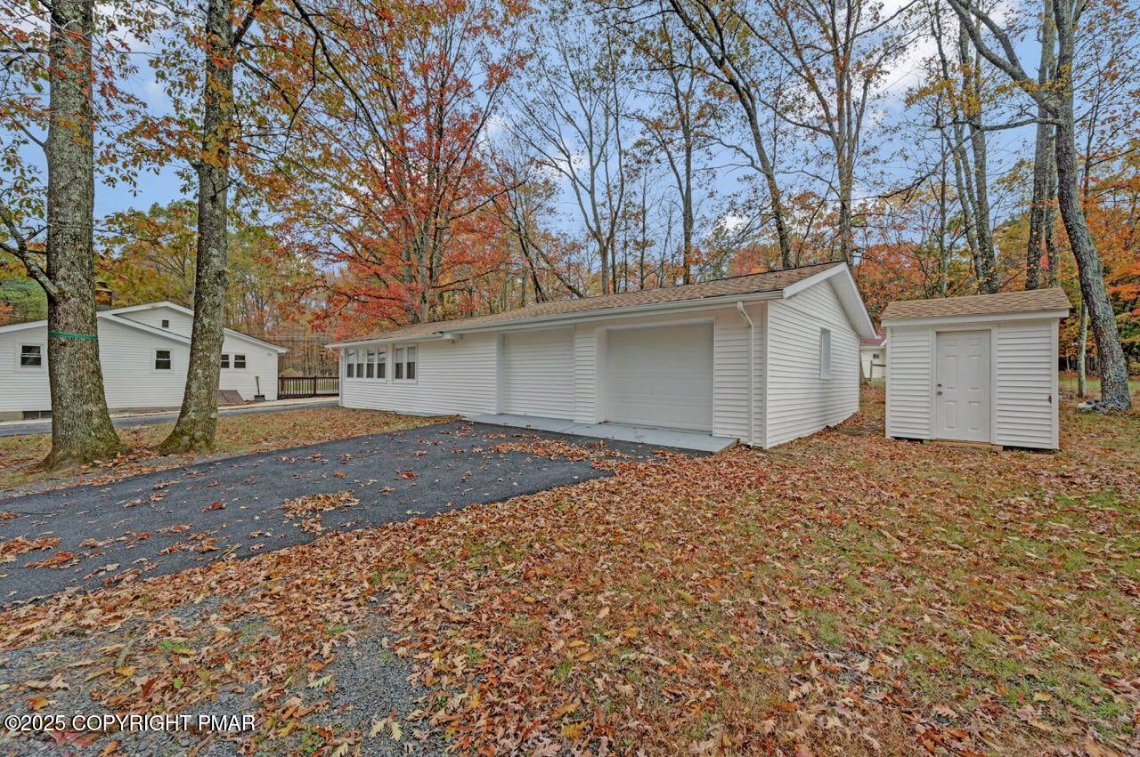 752 Toll Road Effort, PA 18330 - Photo 88 of 101 a backyard of a house with large trees
