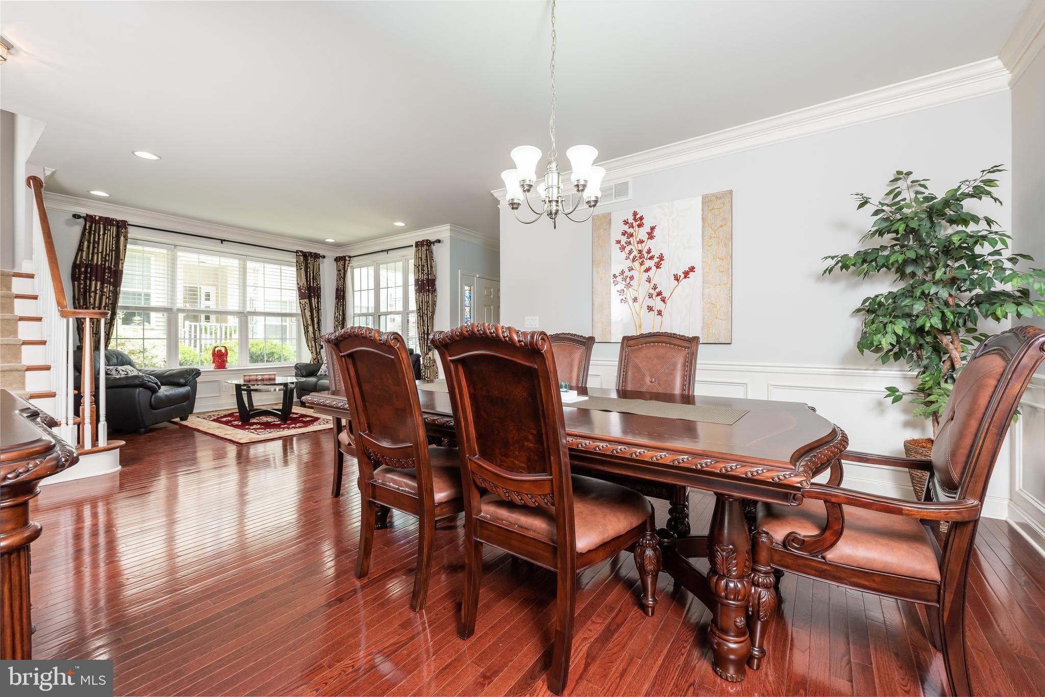 2604 Rockledge Court Chester Springs, PA 19425 - Photo 13 of 44 a view of a dining room with furniture window and wooden floor