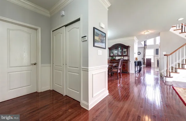 a view of a living room and dining room