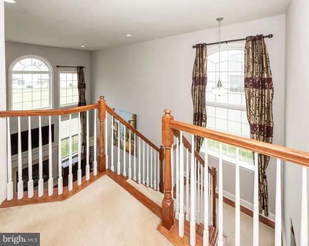 a view of a porch with wooden floor