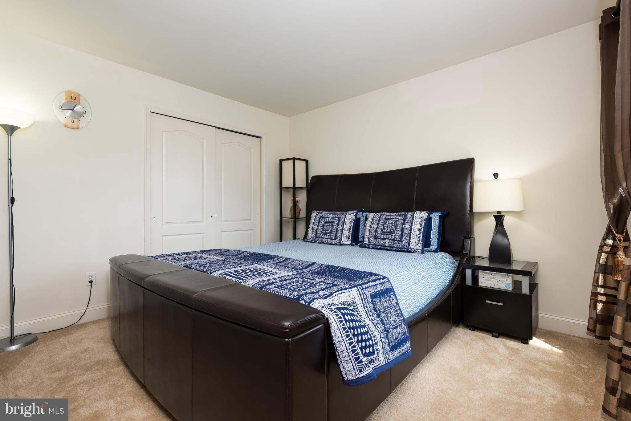 2604 Rockledge Court Chester Springs, PA 19425 - Photo 41 of 44 a bedroom with a bed and a night stand