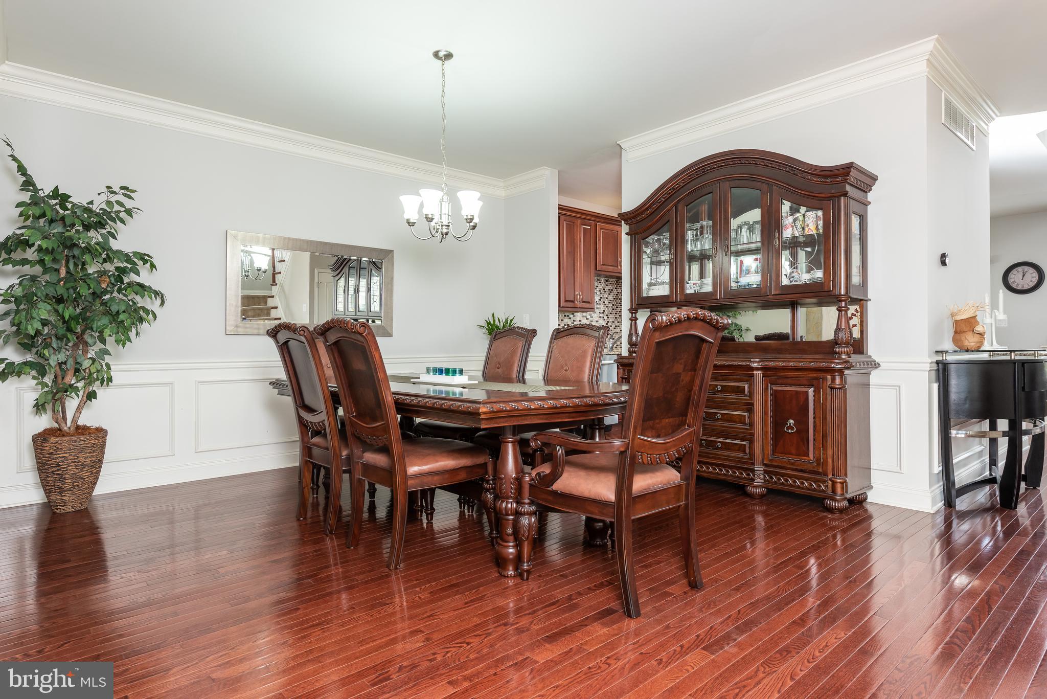 2604 Rockledge Court Chester Springs, PA 19425 - Photo 8 of 44 a view of a dining room with furniture and wooden floor
