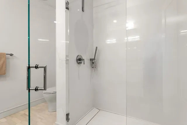a bathroom with a granite countertop mirror