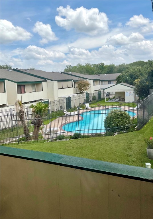 6718 Silvermine Drive, Unit 702 Austin, TX 78736 - Photo 18 of 19 a front view of a house with a yard