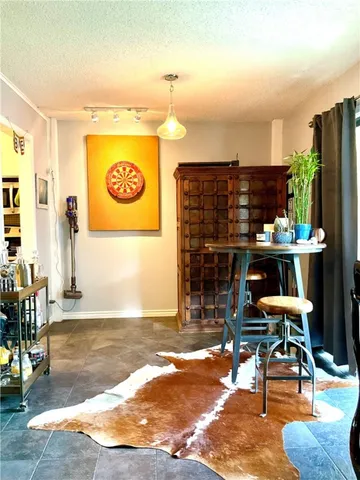 a view of a lobby with furniture and rug