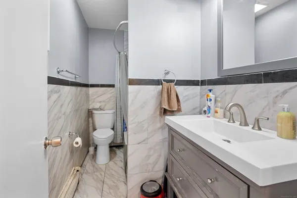 a bathroom with a sink and a toilet