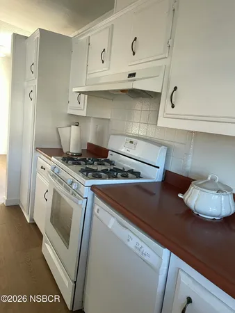 a view of two chairs in a room