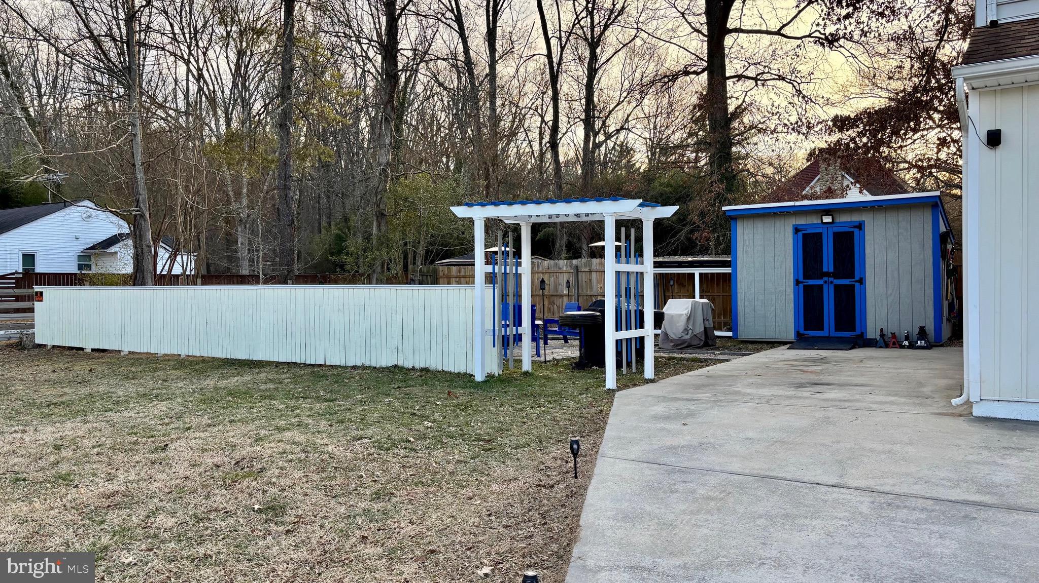 142 Farmington Road West Accokeek, MD 20607 - Photo 11 of 112 a view of a house with a yard and large tree
