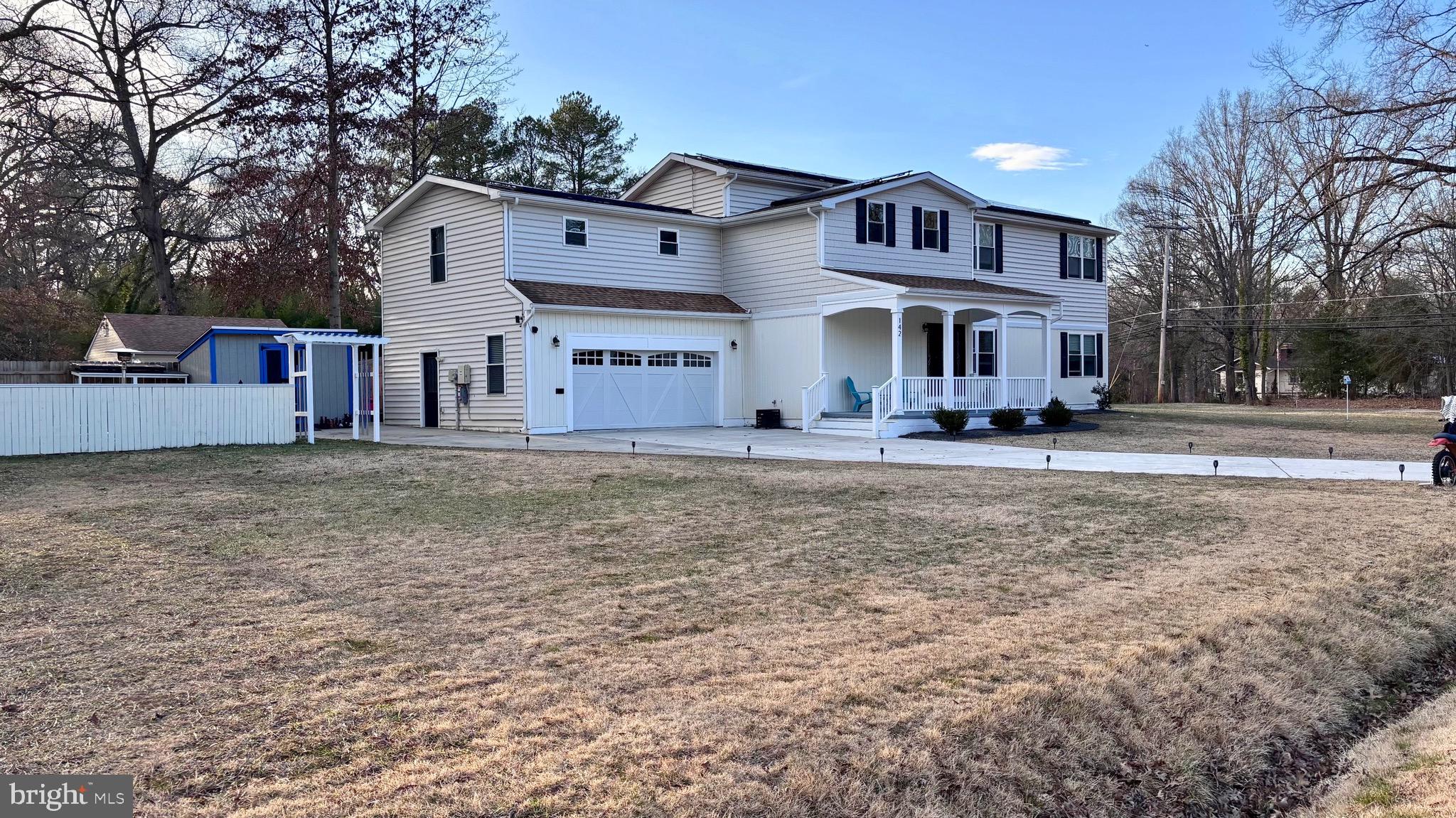 142 Farmington Road West Accokeek, MD 20607 - Photo 3 of 112 a front view of a house with a yard