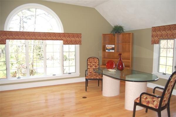 24 Carriage Drive Lexington, MA 02420 - Photo 16 of 30 a living room with furniture and a window