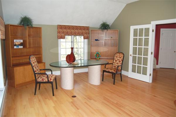 24 Carriage Drive Lexington, MA 02420 - Photo 17 of 30 a dining room with furniture and wooden floor