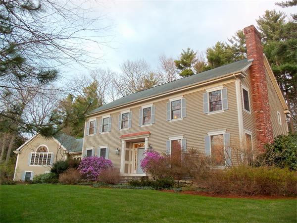 24 Carriage Drive Lexington, MA 02420 - Photo 2 of 30 a front view of house with yard and green space