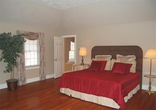 24 Carriage Drive Lexington, MA 02420 - Photo 22 of 30 a bedroom with a bed and window