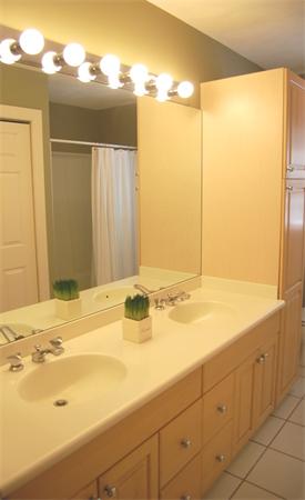 24 Carriage Drive Lexington, MA 02420 - Photo 27 of 30 a bathroom with a sink and a mirror
