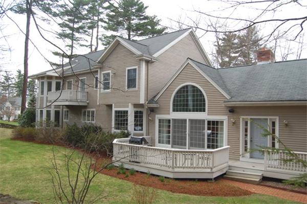 24 Carriage Drive Lexington, MA 02420 - Photo 28 of 30 a front view of house with yard and green space