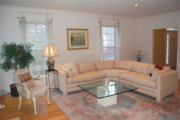24 Carriage Drive Lexington, MA 02420 - Photo 4 of 30 a living room with furniture and a window