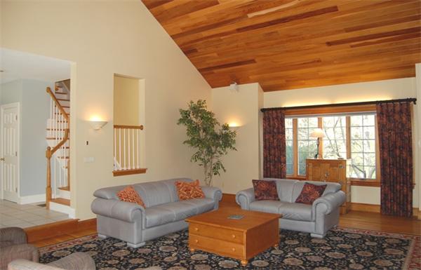 24 Carriage Drive Lexington, MA 02420 - Photo 7 of 30 a living room with furniture and a large window