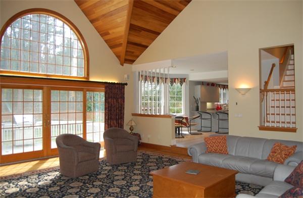 24 Carriage Drive Lexington, MA 02420 - Photo 10 of 30 a living room with furniture and a large window