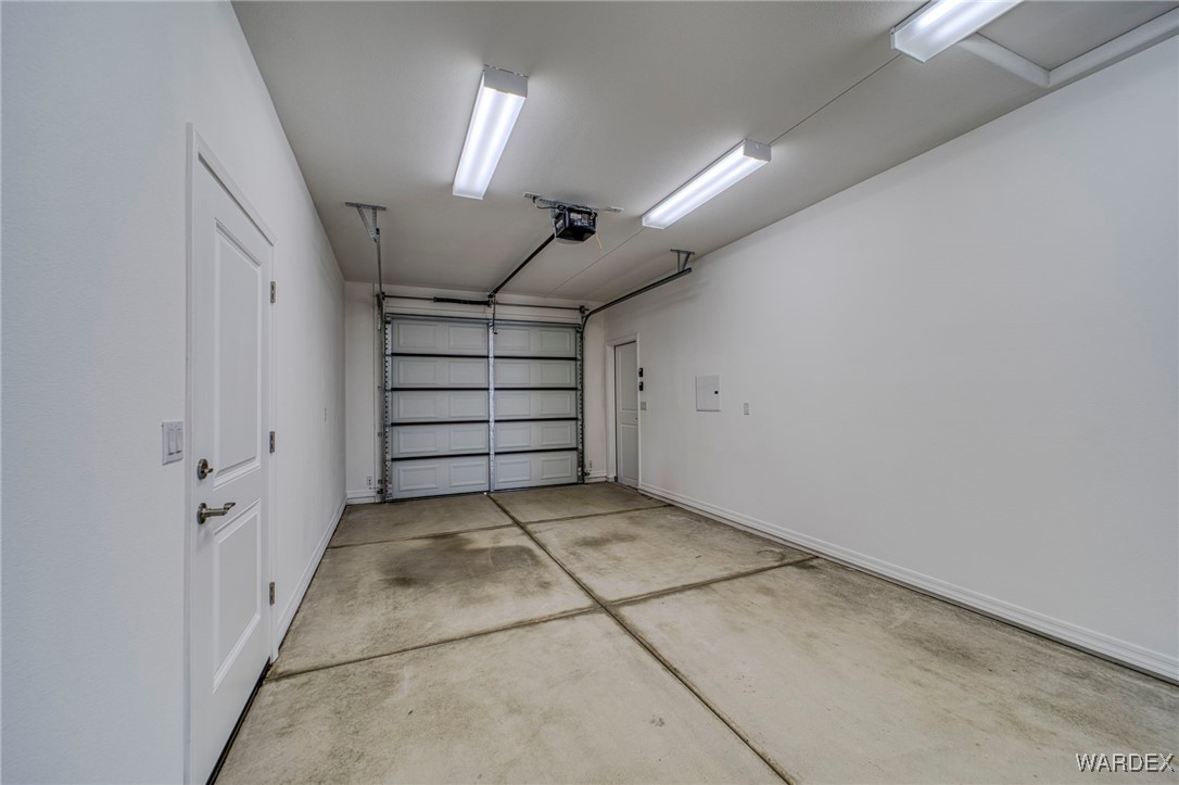 1820 Balsa Road Bullhead City, AZ 86442 - Photo 45 of 73 Garage featuring a garage door opener