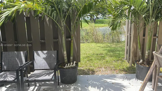 a view of a lake with a yard