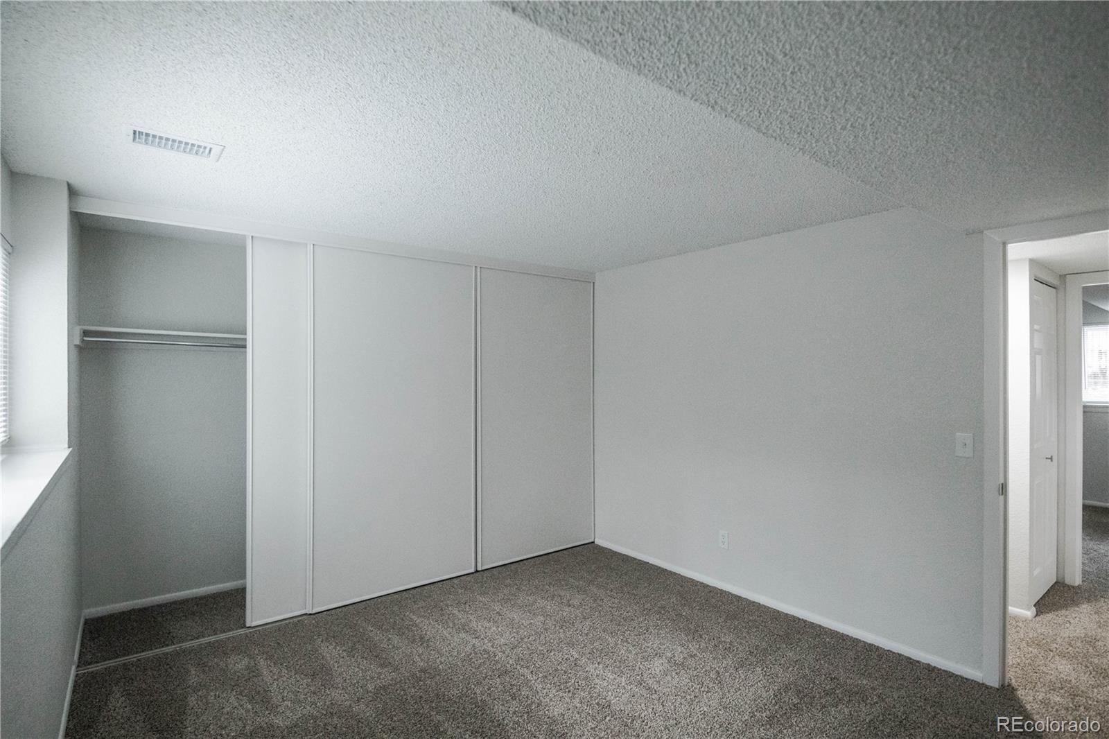 2920 South Racine Street Aurora, CO 80014 - Photo 23 of 36 a view of an empty room