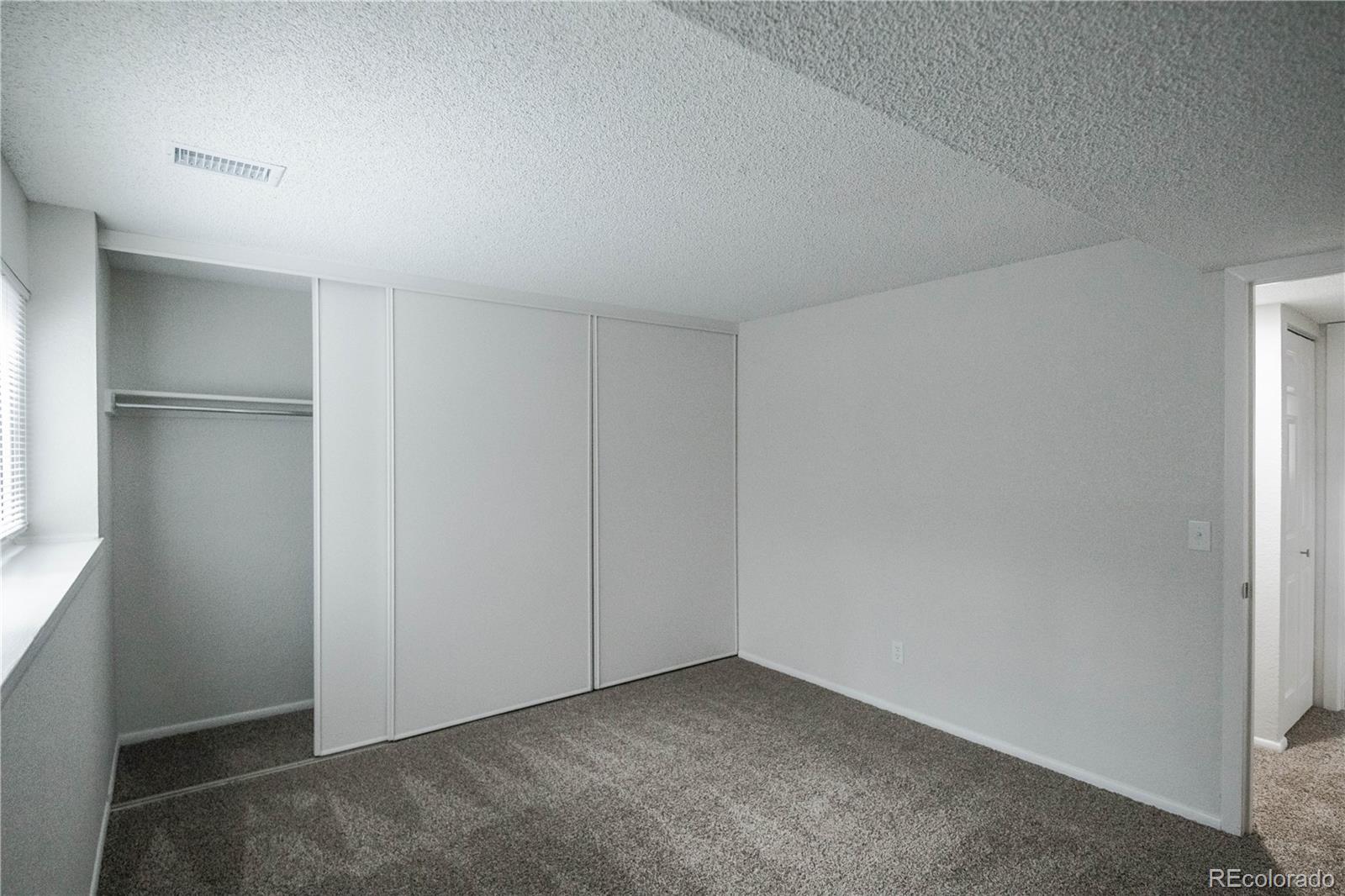 2920 South Racine Street Aurora, CO 80014 - Photo 24 of 36 a view of an empty room