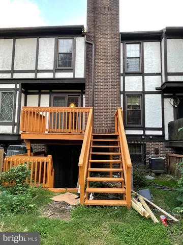 a view of front door of house with yard