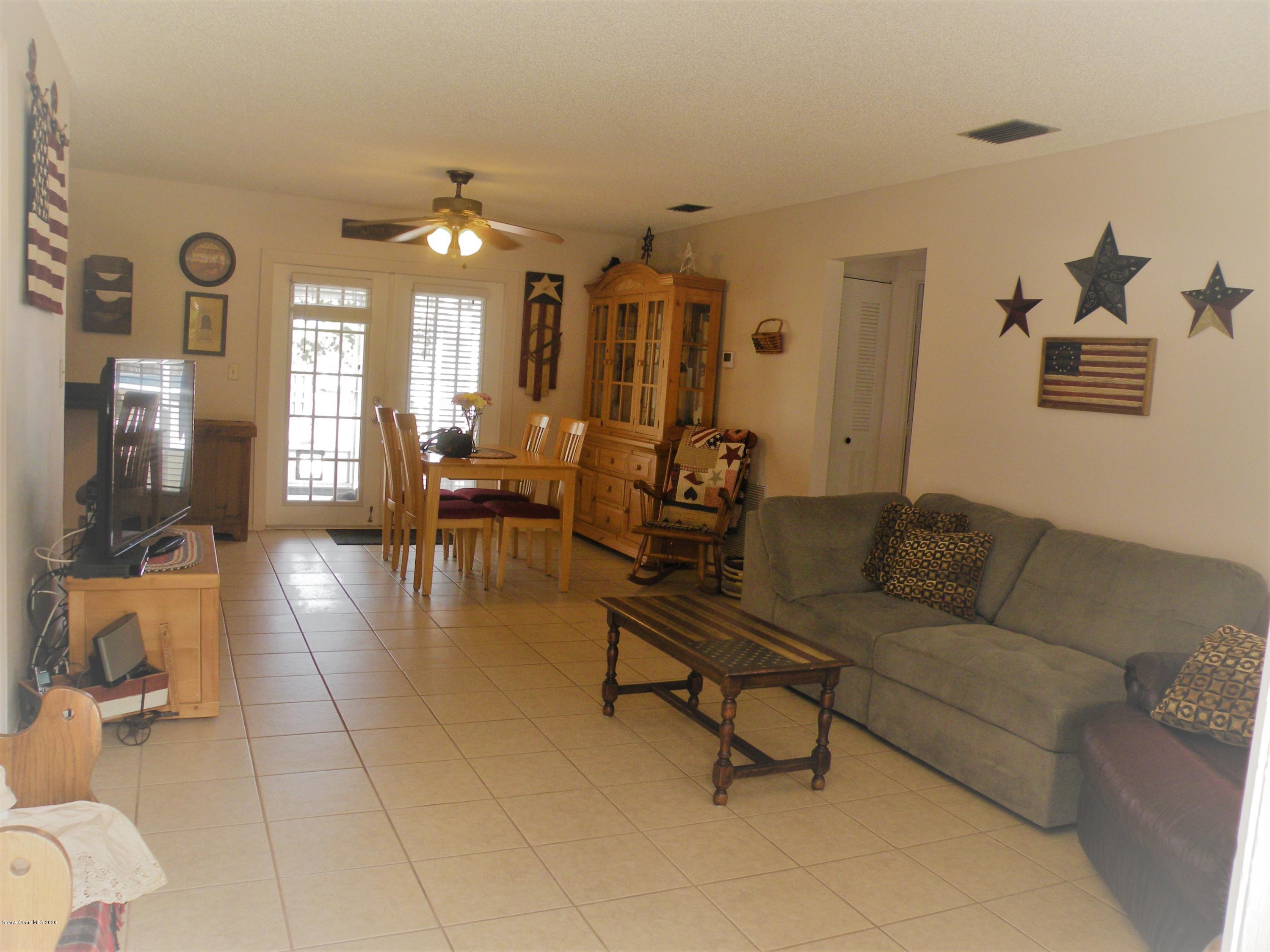 367 Lisa Road Northeast Palm Bay, FL 32907 - Photo 3 of 17 Living / Dining