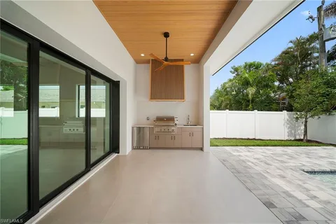 a view of livingroom with furniture and floor to ceiling window