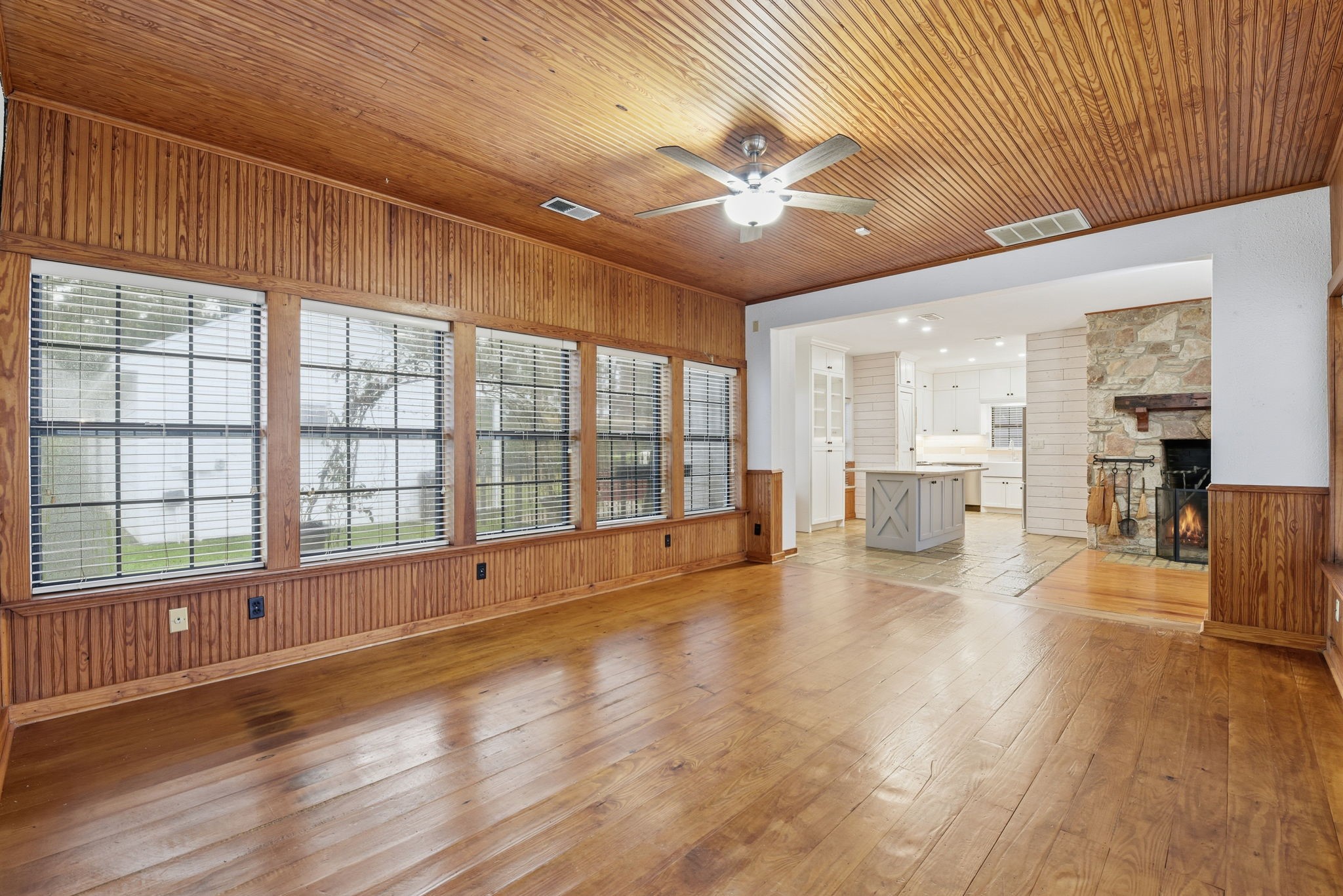 21531 Tophill Drive Spring, TX 77388 - Photo 15 of 49 a view of an empty room with a window and wooden floor