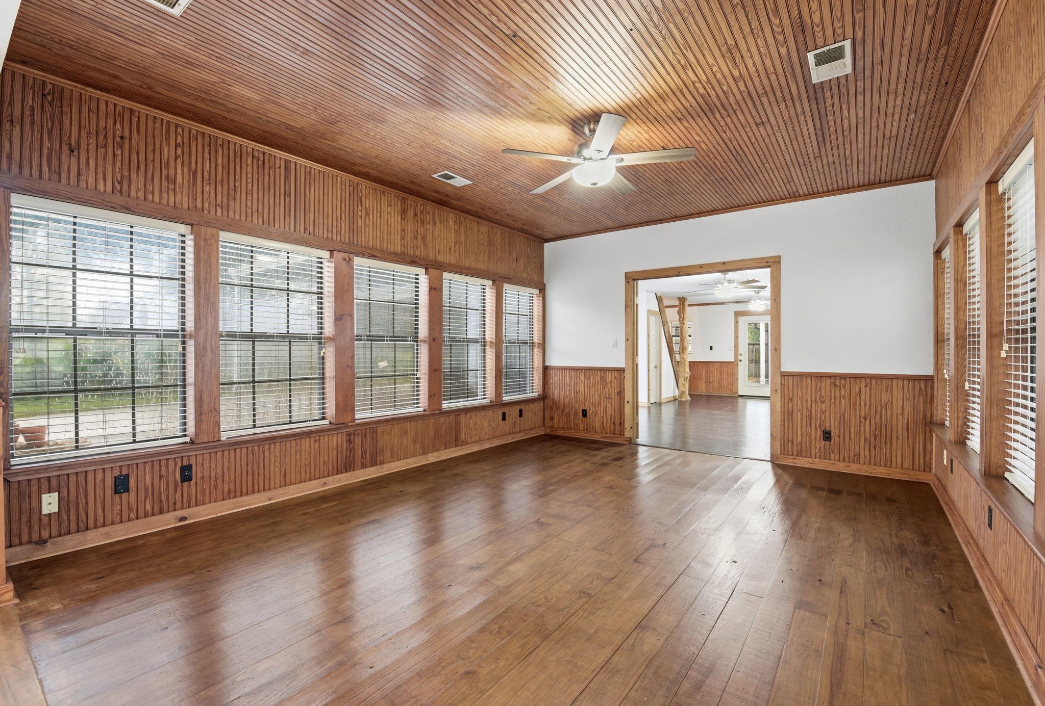 21531 Tophill Drive Spring, TX 77388 - Photo 17 of 49 wooden floor in an empty room with a window