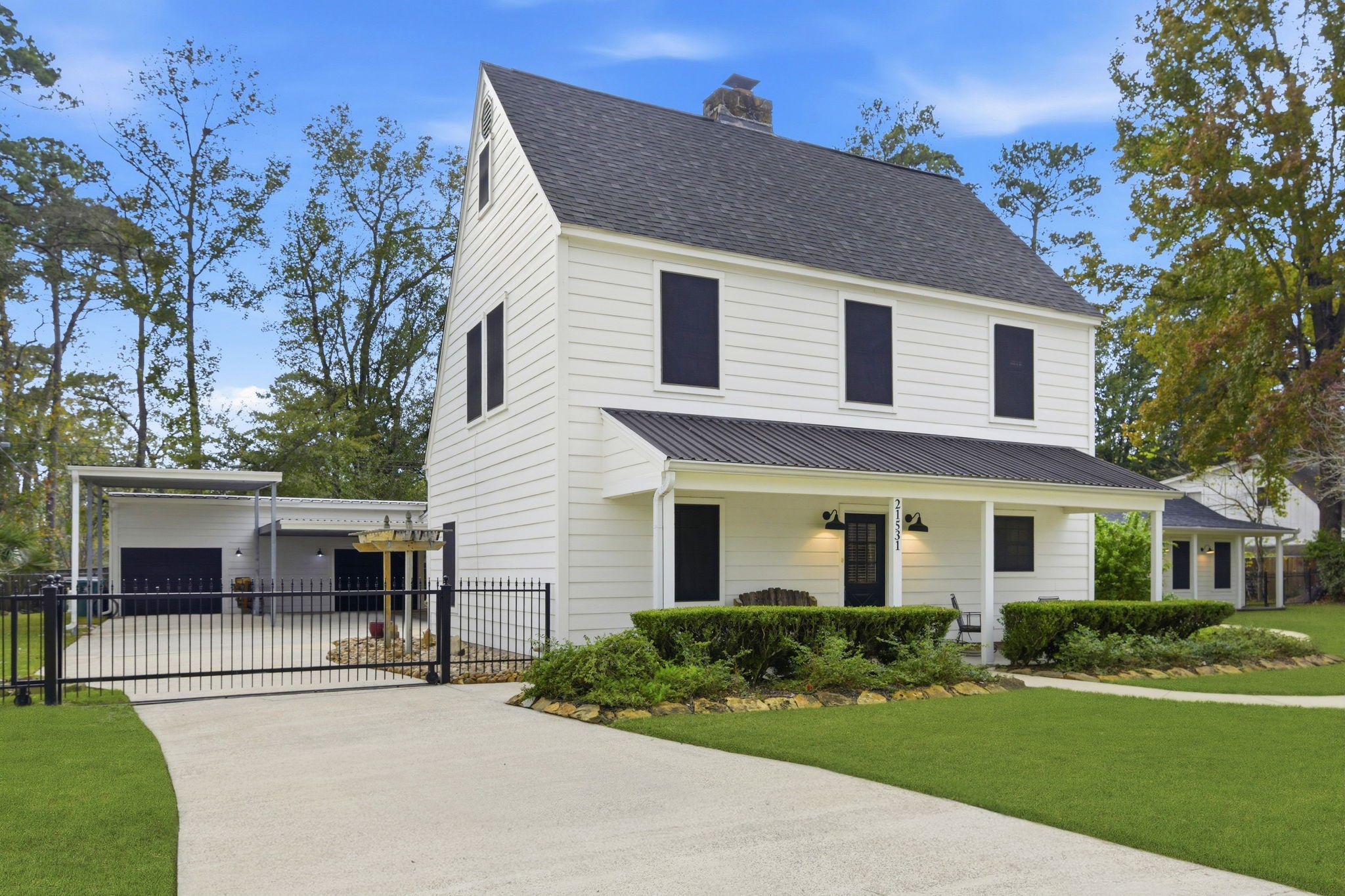 21531 Tophill Drive Spring, TX 77388 - Photo 2 of 49 a front view of a house with a yard and garage
