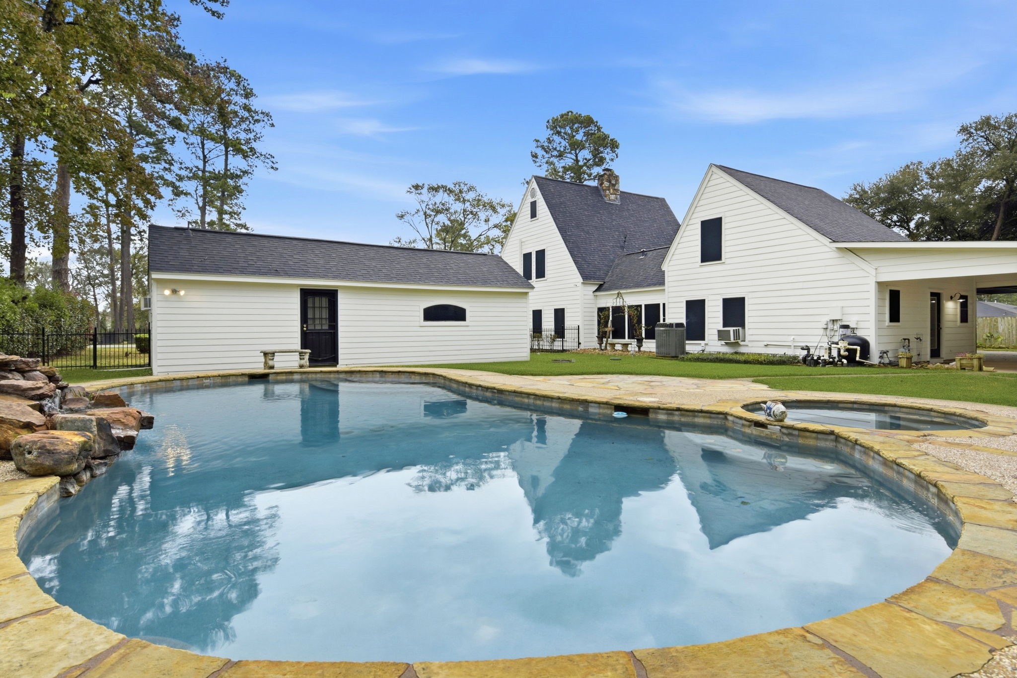 21531 Tophill Drive Spring, TX 77388 - Photo 42 of 49 a view of a house with swimming pool