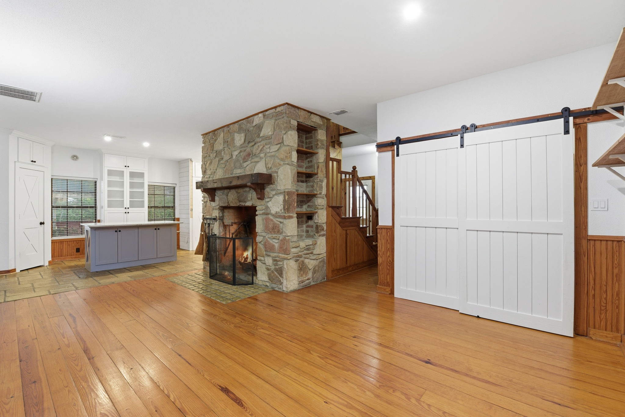 21531 Tophill Drive Spring, TX 77388 - Photo 7 of 49 a view of empty room with wooden floor and fireplace