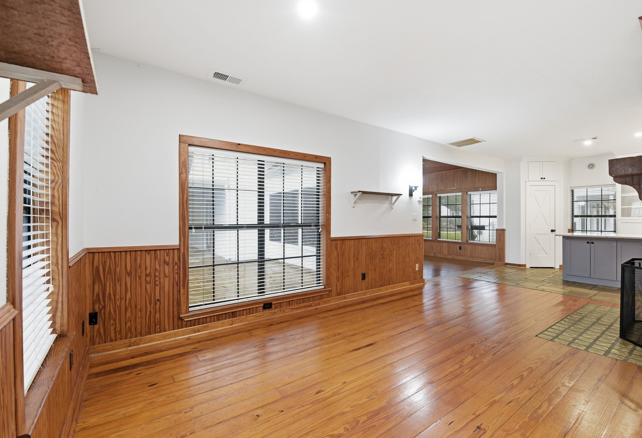 21531 Tophill Drive Spring, TX 77388 - Photo 8 of 49 a view of empty room with wooden floor and windows