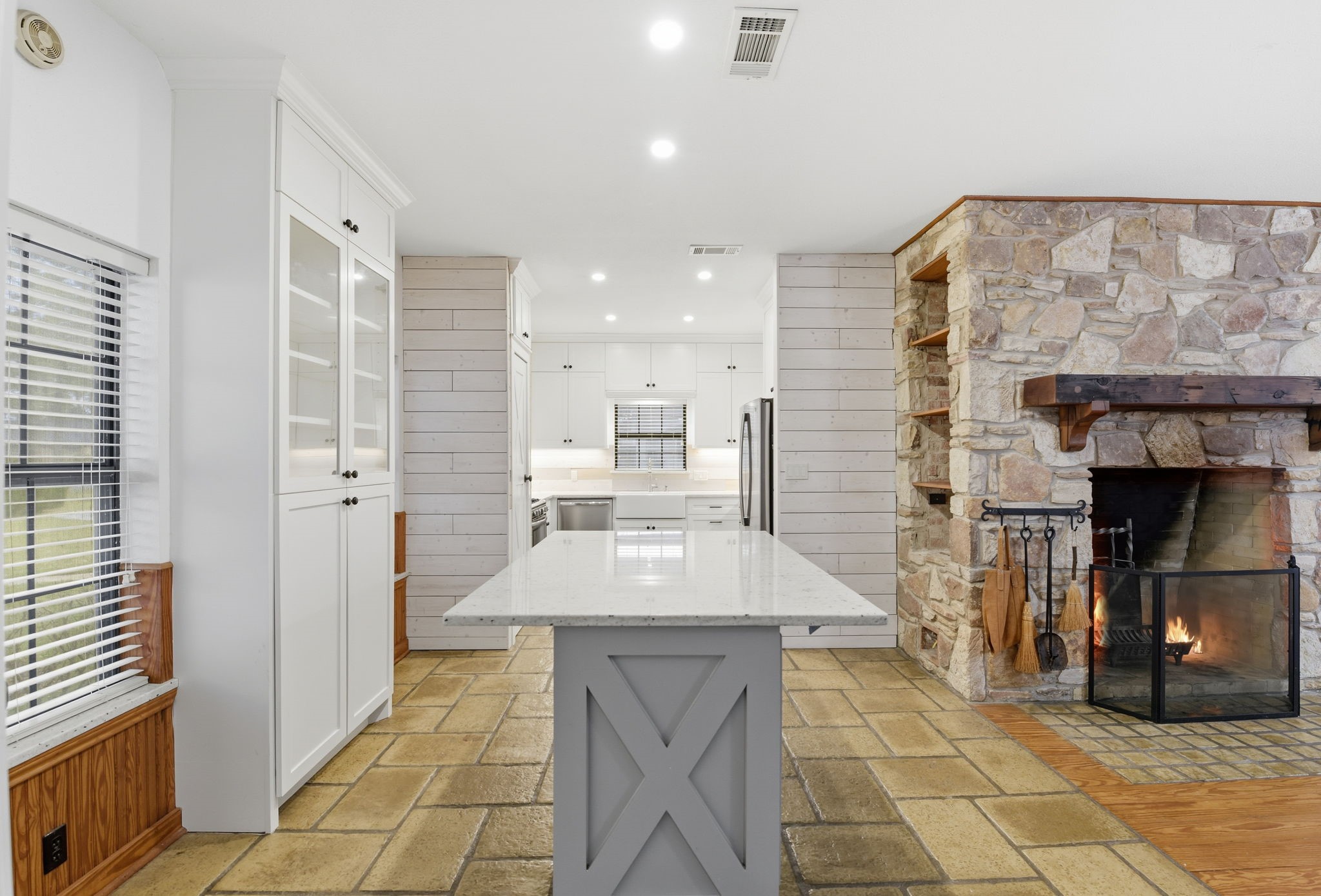 21531 Tophill Drive Spring, TX 77388 - Photo 10 of 49 a dining hall with a sink and a fireplace