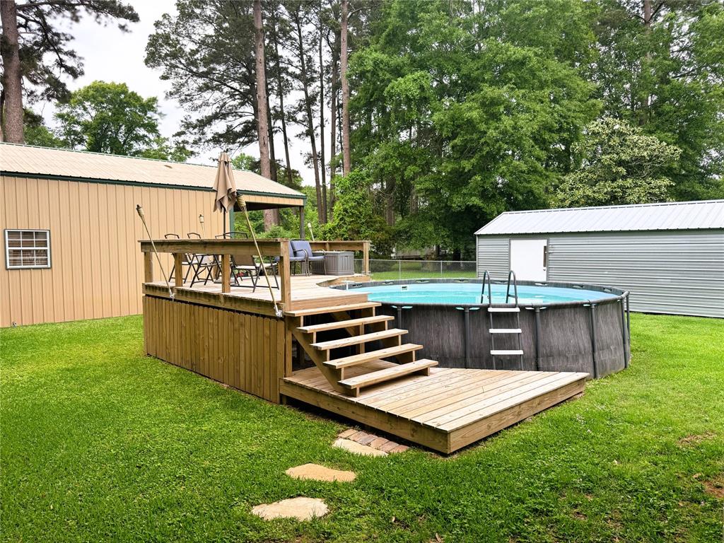 310 Murray Lane Haughton, LA 71037 - Photo 16 of 17 a view of a house with a backyard
