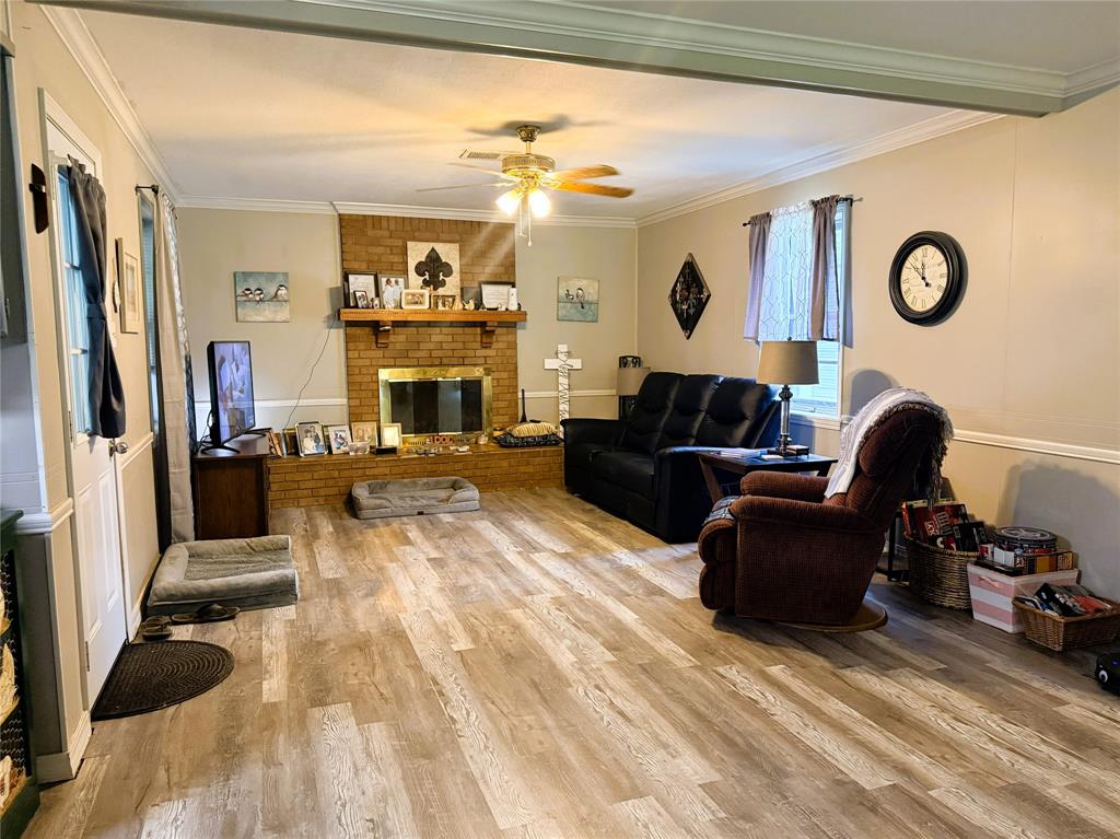 310 Murray Lane Haughton, LA 71037 - Photo 2 of 17 a living room with furniture and a fireplace