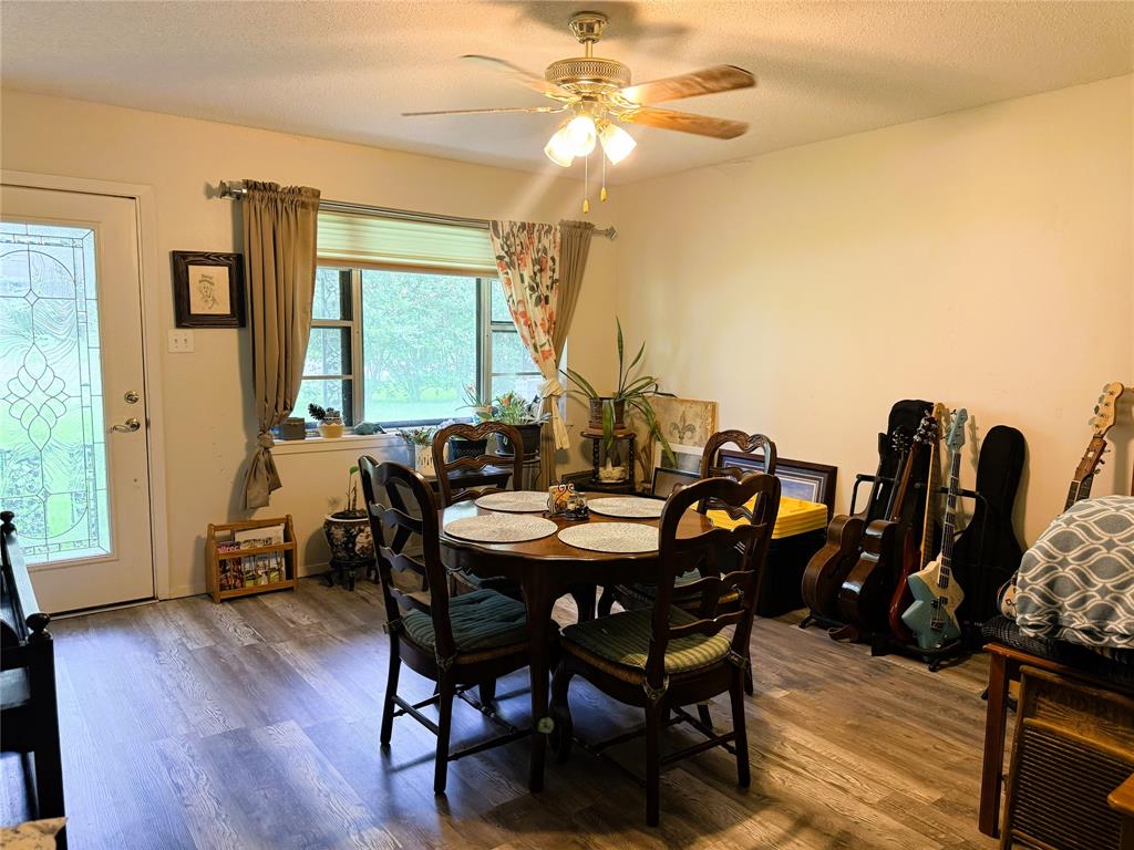 310 Murray Lane Haughton, LA 71037 - Photo 6 of 17 a view of a dining room with furniture and wooden floor