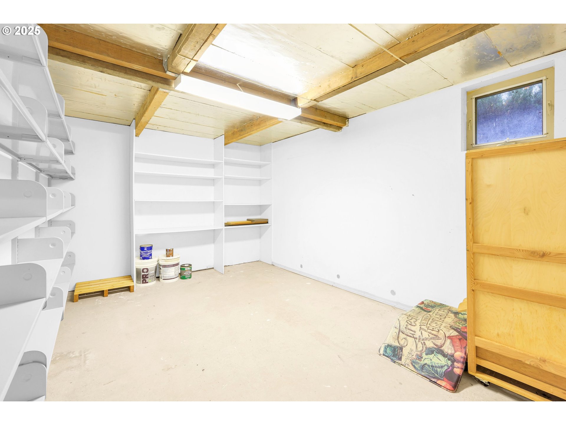 1003 Northwest 132nd Street Vancouver, WA 98685 - Photo 25 of 26 a utility room with a bed and a window