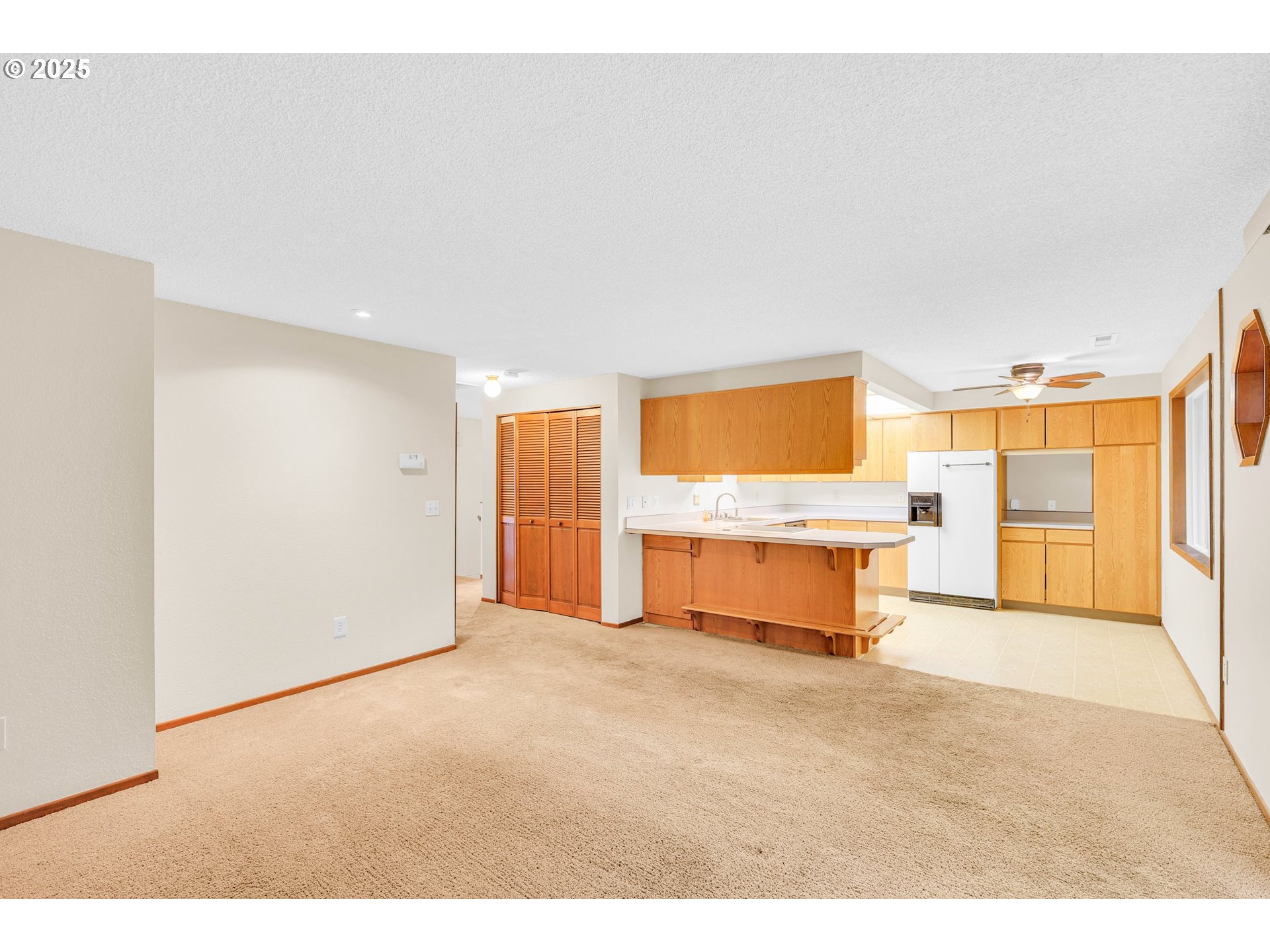 1003 Northwest 132nd Street Vancouver, WA 98685 - Photo 3 of 26 a view of an empty room with a window
