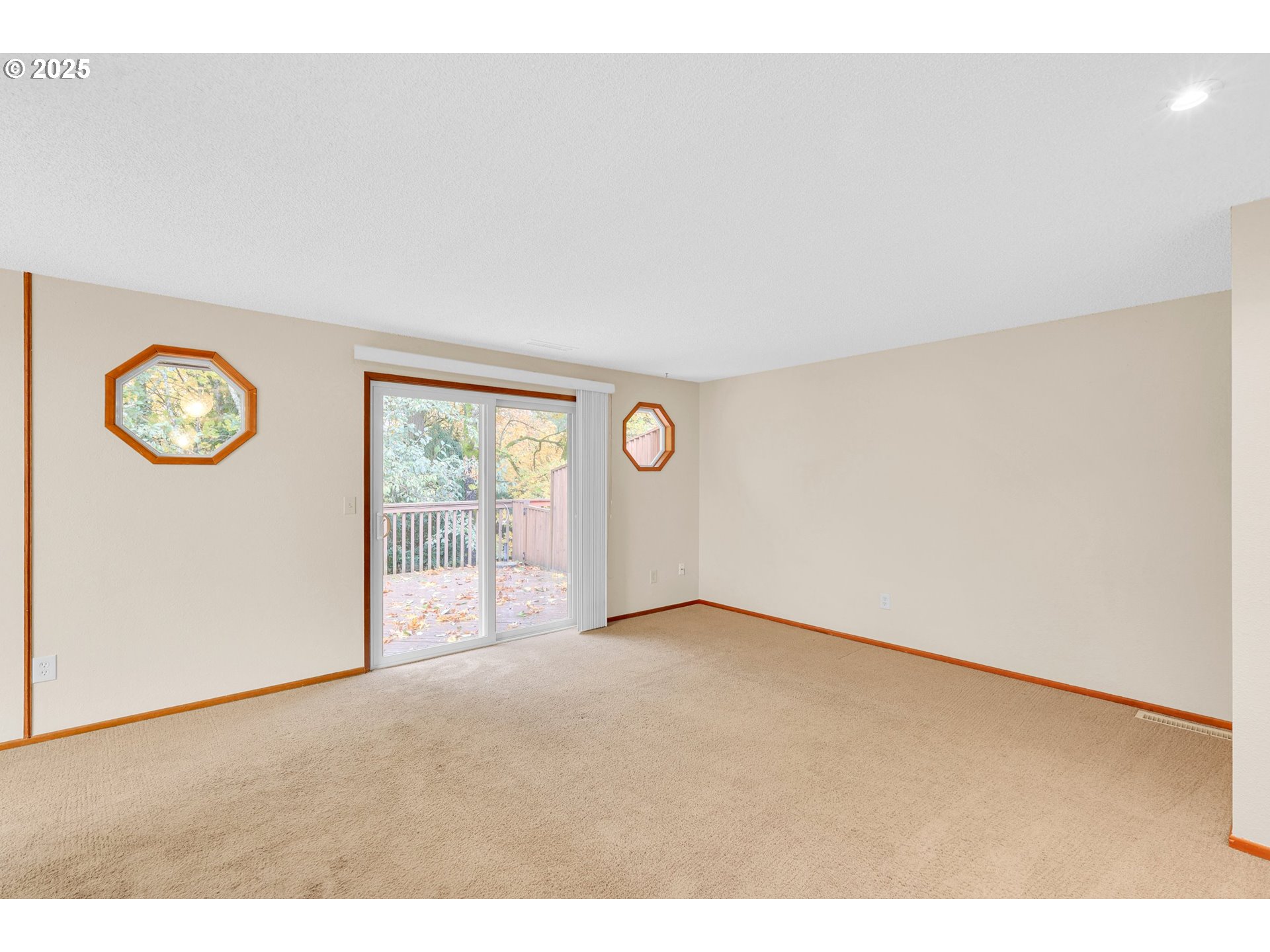 1003 Northwest 132nd Street Vancouver, WA 98685 - Photo 8 of 26 a view of an empty room with a window