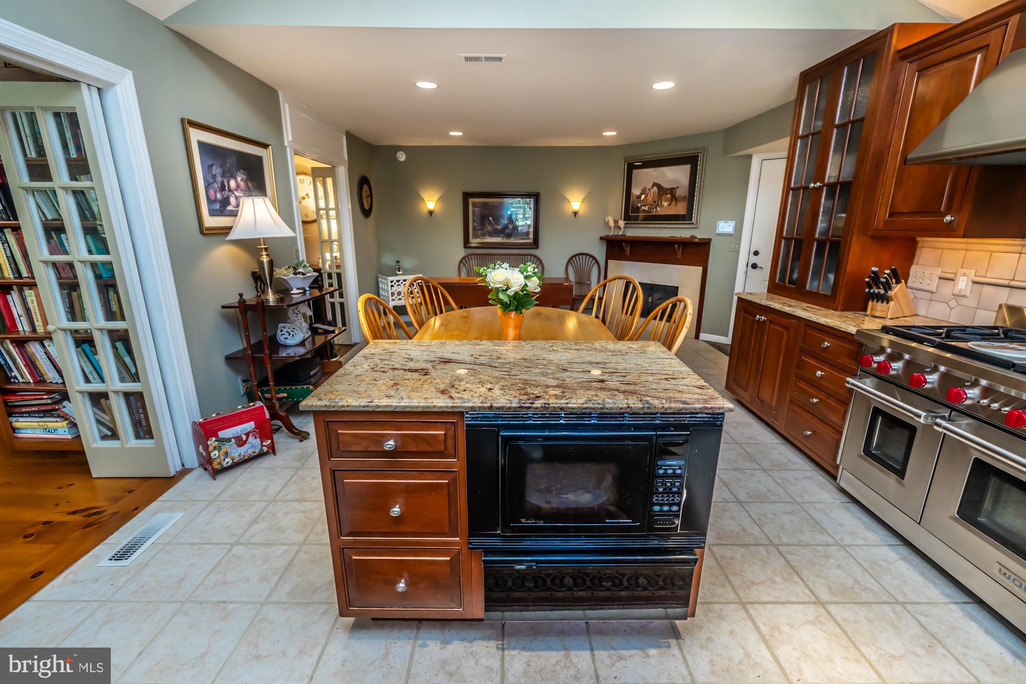 414 Manor Drive Kennett Square, PA 19348 - Photo 18 of 35 a living room with furniture and a fireplace