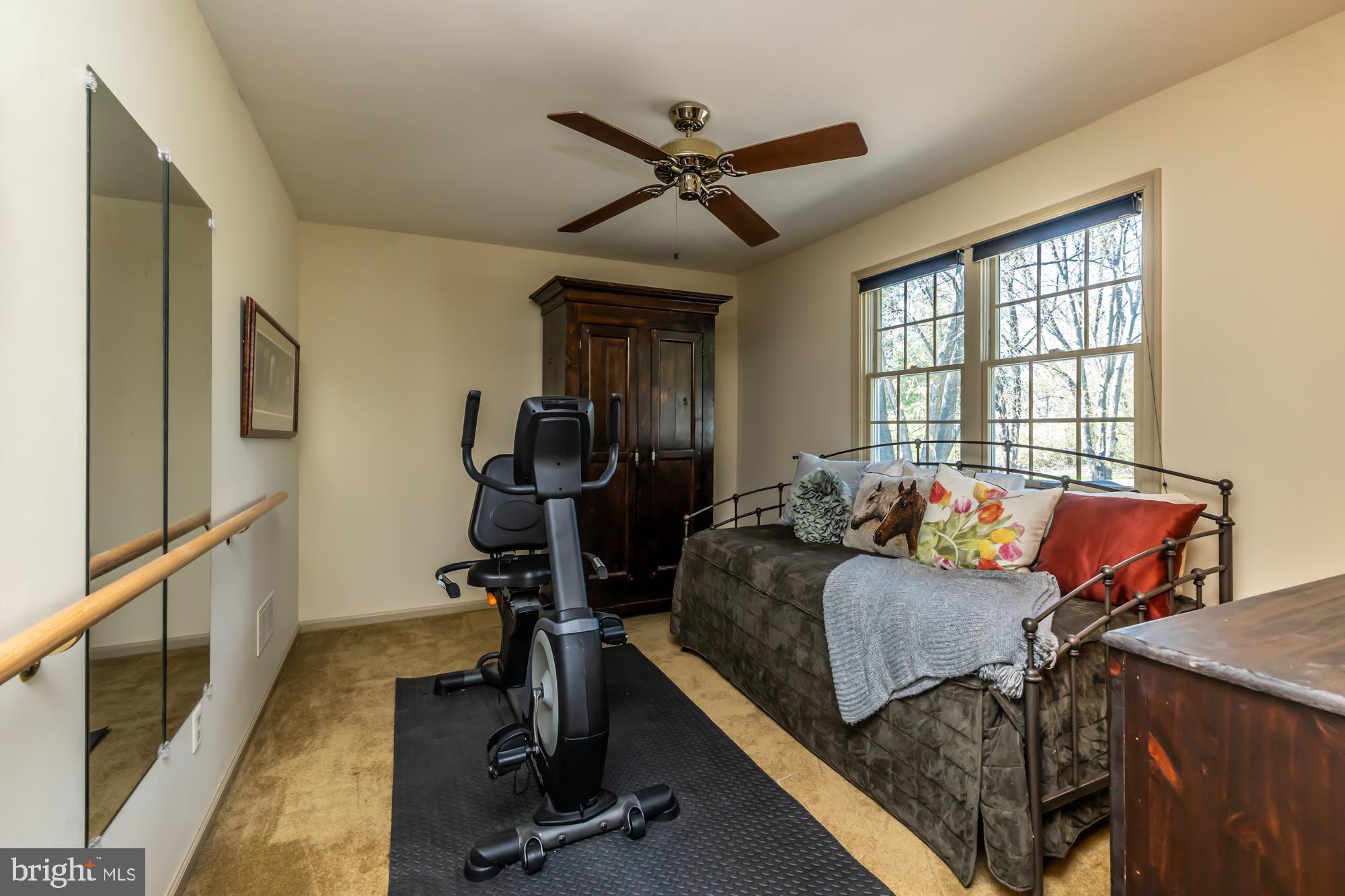 414 Manor Drive Kennett Square, PA 19348 - Photo 30 of 35 a bedroom with furniture and a window