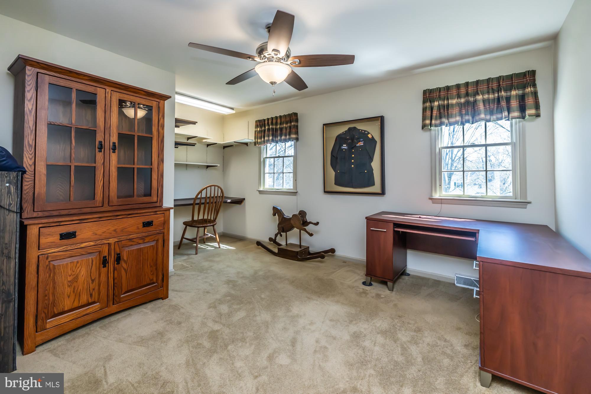 414 Manor Drive Kennett Square, PA 19348 - Photo 31 of 35 a room with furniture and two windows