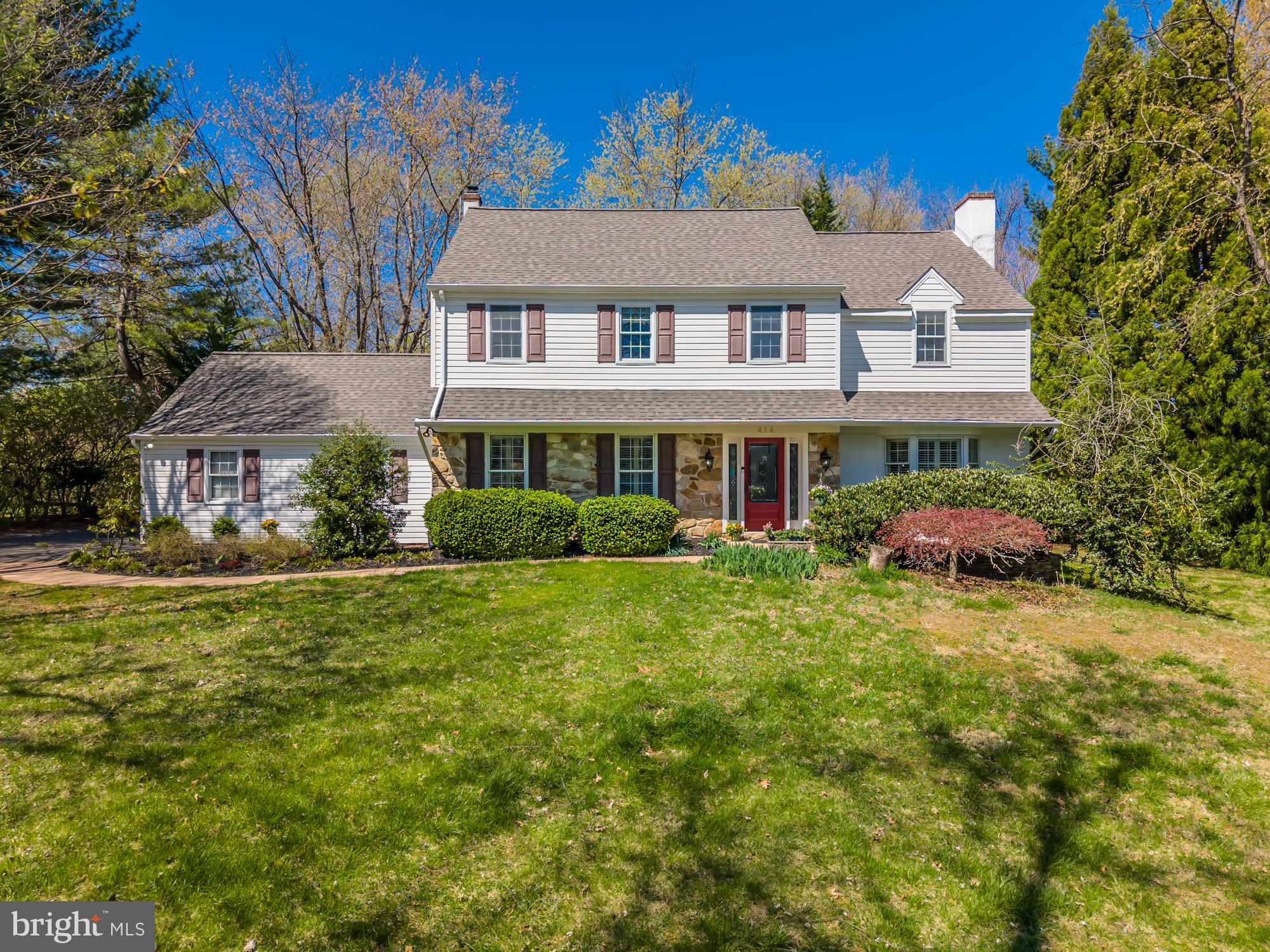 414 Manor Drive Kennett Square, PA 19348 - Photo 6 of 35 a front view of a house with a garden