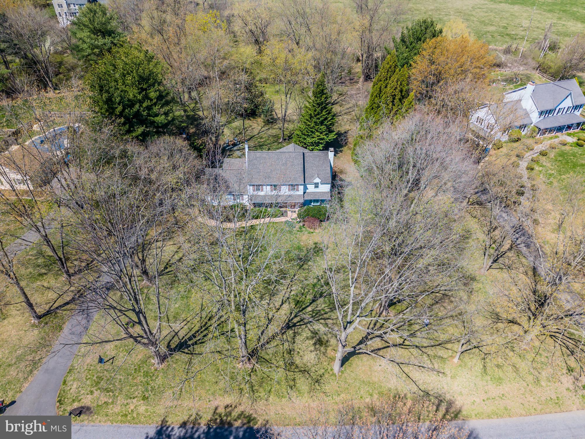 414 Manor Drive Kennett Square, PA 19348 - Photo 8 of 35 a backyard of a house with lots of green space