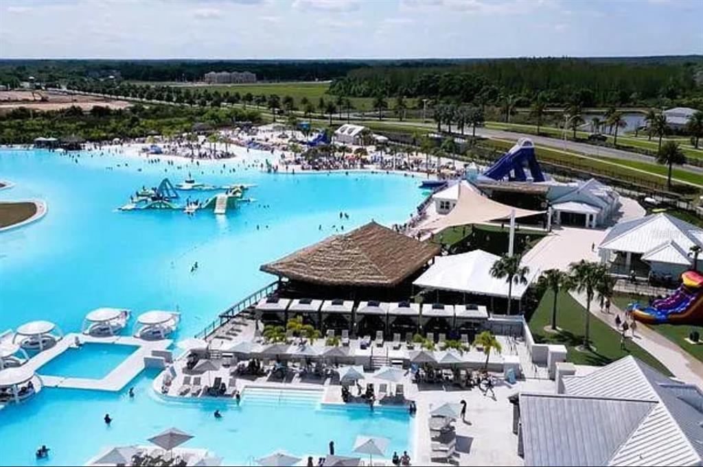 31699 Sun Kettle Loop Wesley Chapel, FL 33545 - Photo 13 of 18 a view of a lake from a terrace